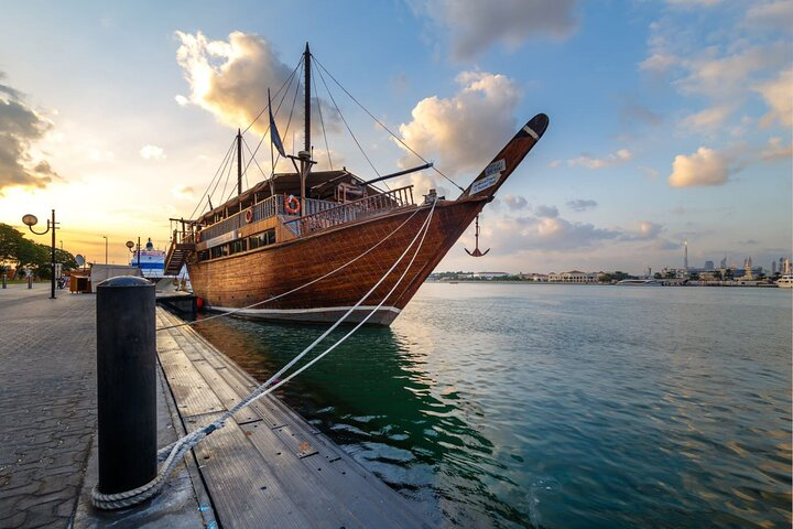 Savor a unique dining experience aboard a wooden dhow drifting along Dubai Creek as the sun sets and the lights reflect off the tranquil waters of old Dubai.